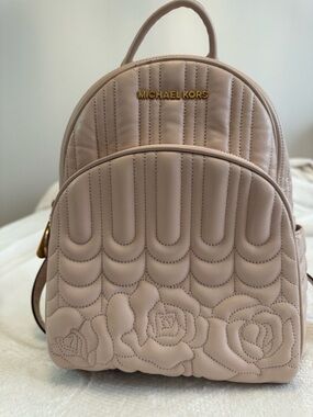 Michael Kors Pink Quilted Leather Mini Backpack with Floral Stitching